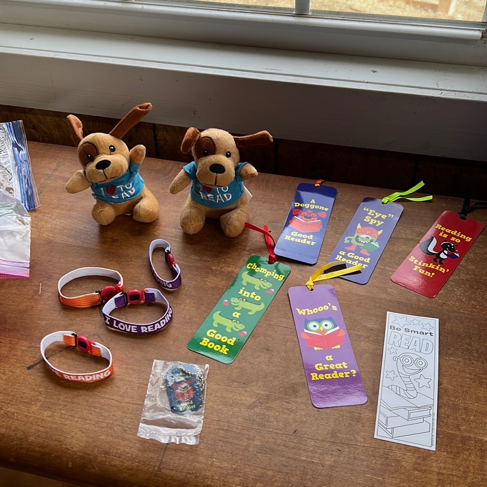 Reading Awards All new. Bookmarks Bracelets. Stuffed Dogs. Dog Tag Nevklaces